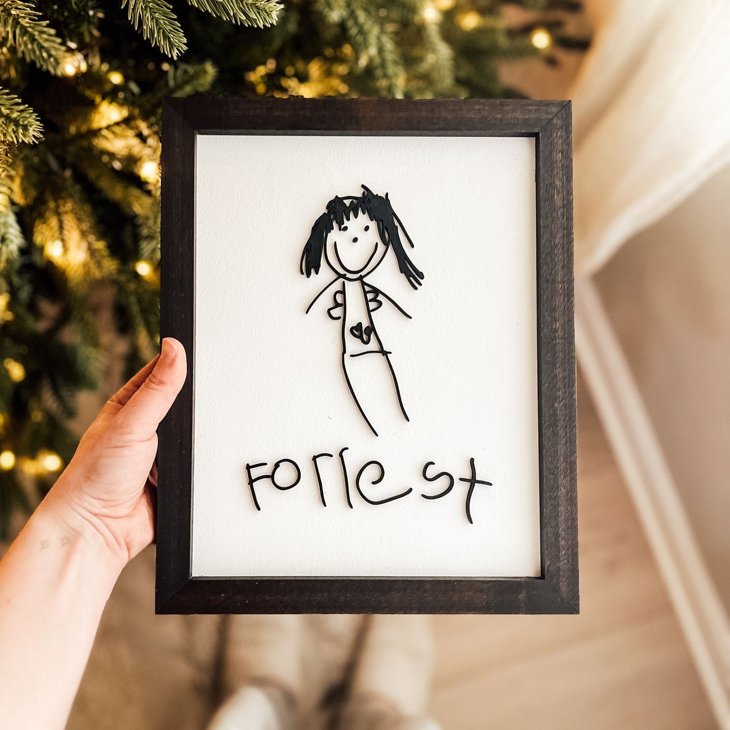 Kid’s self portrait + name